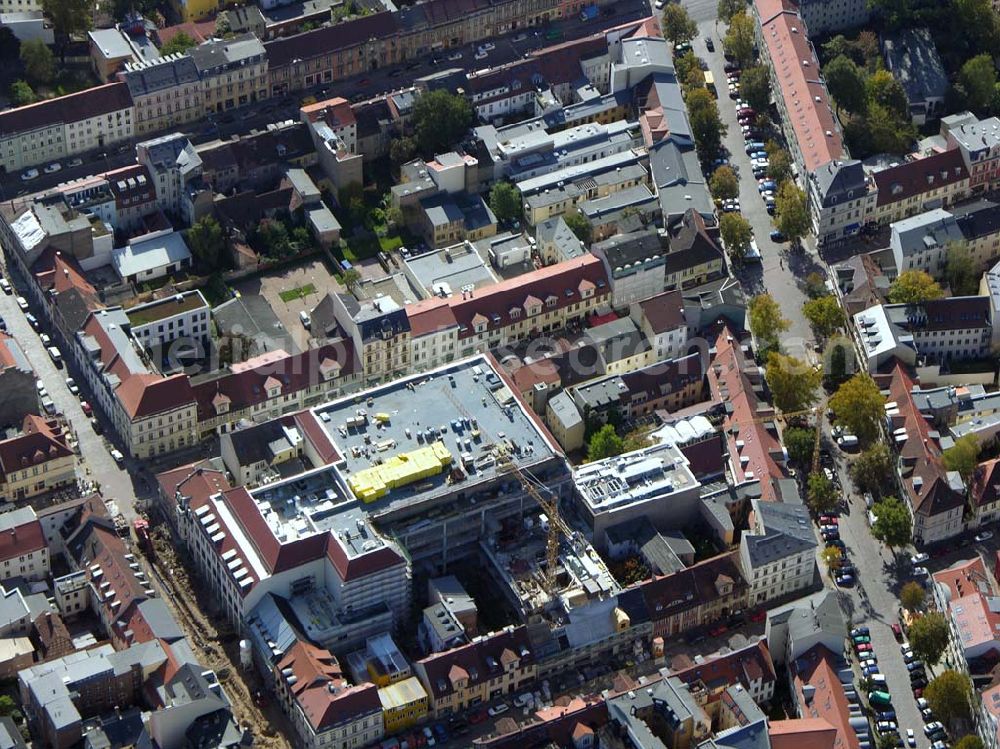 Potsdam from the bird's eye view: Neubau Karstadt Kaufhaus Potsdam an der Brandenburger Straße. Karstadt Immobilien AG (Pressesprecher: Erich Jeske 0911 / 14 - 23459 oder - 22224, 0911 / 14-24330,erich.jeske@quelle.de), Projektsteuerung: Josef Esch Vermögensverwaltungs GmbH (022419870, info@jefp.biz, Fr Stassen), Firma Ernst Jung (0302547121350, carola.voelkner@de.gy.com, Fr. Völkner), Hochtief Erfurt (0331743440, katrin.toepfer@hochtief.de, Fr. Toepfer), Fassade:Firma Roland Schulze (0331296816, info@baudenkmalpflege.de, Fr. Schulze).