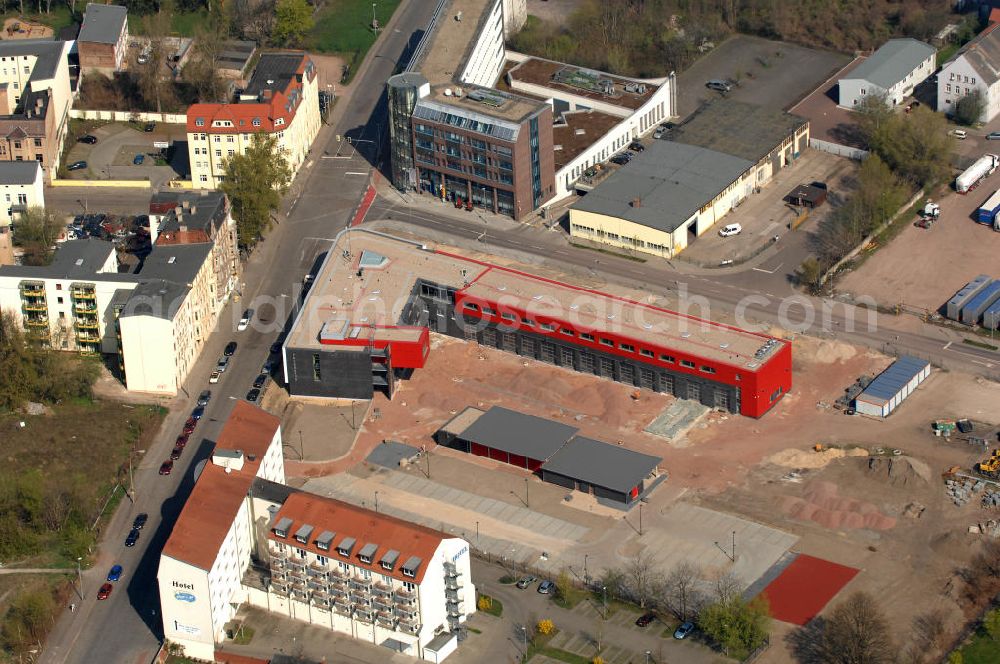 Aerial photograph Magdeburg - Blick auf die neu erbaute Feuerwache Nord der Berufsfeuerwehr in Alte Neustadt, Magdeburg an der Rogätzer Straße Ecke Peter-Paul-Straße. Kontakt: Herr Branddirektor Olaf Derlath, Steuerung, Verwaltung, Abteilungsleiter, Peter-Paul-Str. 12, 39106 Magdeburg, Tel. +49(0)391 540 11-30, Fax -81, feuerwehr@magdeburg.de