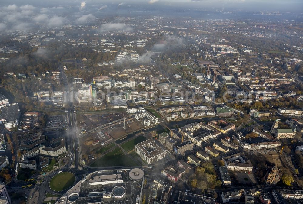 Aerial photograph Essen - View of the construction site for the new build quarter Green Center at Berliner Platz in the city center of Essen in the state North Rhine-Westphalia. Near the University Duisburg-Essen the Development Association University Quarter Essen is developing office buildings, a new auditorium and modern residential buildings