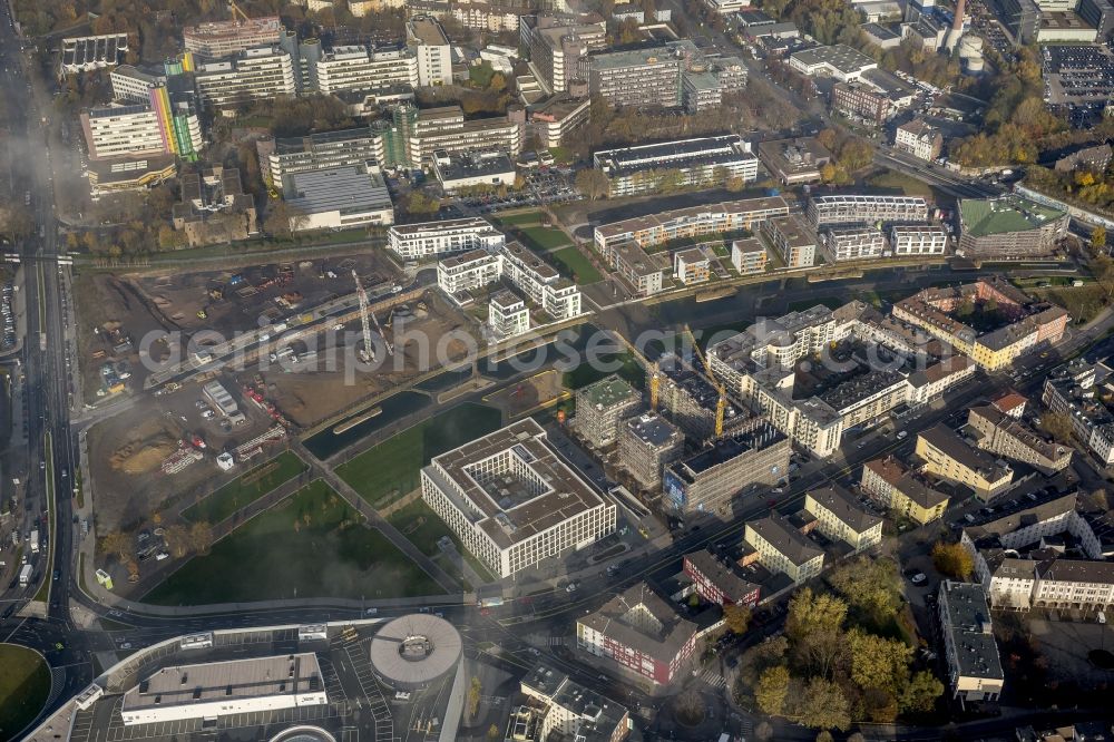 Essen from above - View of the construction site for the new build quarter Green Center at Berliner Platz in the city center of Essen in the state North Rhine-Westphalia. Near the University Duisburg-Essen the Development Association University Quarter Essen is developing office buildings, a new auditorium and modern residential buildings