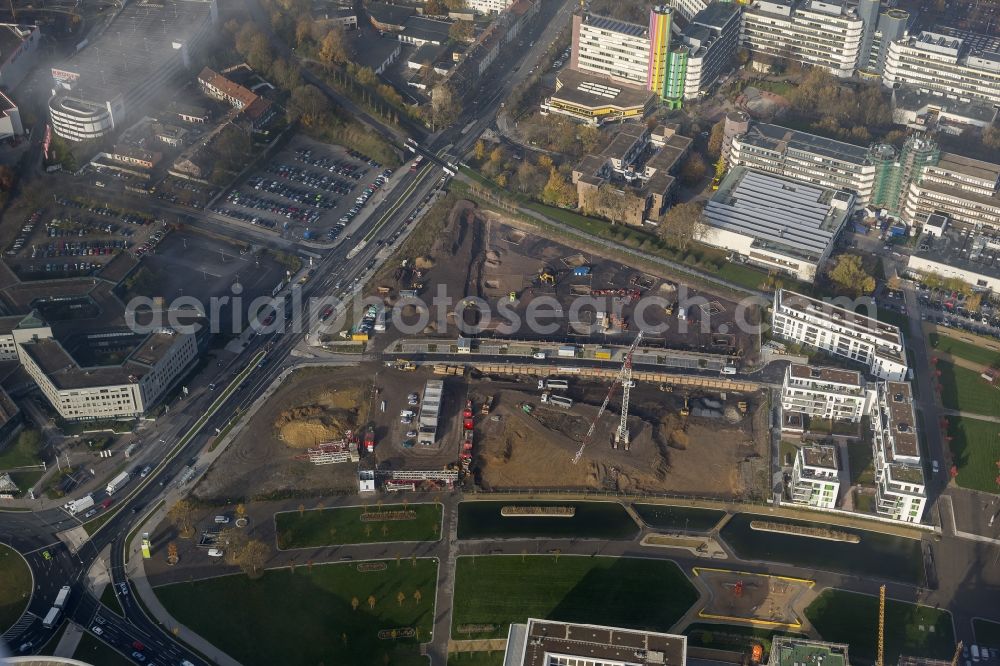 Essen from the bird's eye view: View of the construction site for the new build quarter Green Center at Berliner Platz in the city center of Essen in the state North Rhine-Westphalia. Near the University Duisburg-Essen the Development Association University Quarter Essen is developing office buildings, a new auditorium and modern residential buildings