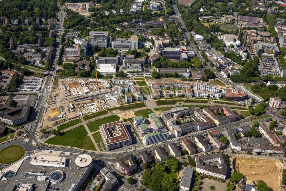 Essen from above - View of the construction site for the new build quarter Green Center at Berliner Platz in the city center of Essen in the state North Rhine-Westphalia. Near the University Duisburg-Essen the Development Association University Quarter Essen is developing office buildings, a new auditorium and modern residential buildings