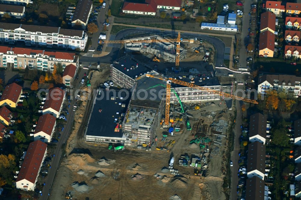 Hönow from the bird's eye view: Construction site of building city destrict center between of Schulstrasse and of Marderstrasse in Hoenow in the state Brandenburg, Germany