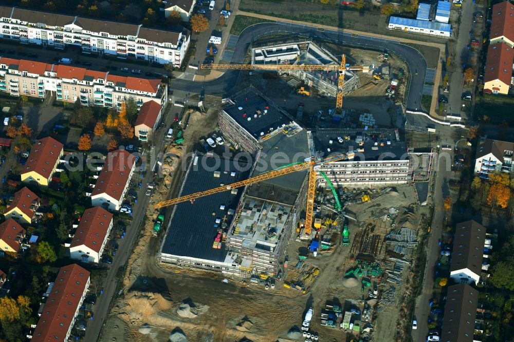 Hönow from the bird's eye view: Construction site of building city destrict center between of Schulstrasse and of Marderstrasse in Hoenow in the state Brandenburg, Germany