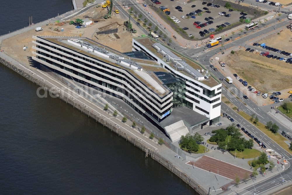 Aerial photograph Hamburg - View of building lot of the new Hafen city University in Hamburg. The building will be constructed on behalf of the Ministry of Science and Research of Hamburg by the company Riedel Bau for the subjects architecture, civil engineering, geomatics and municipal planning