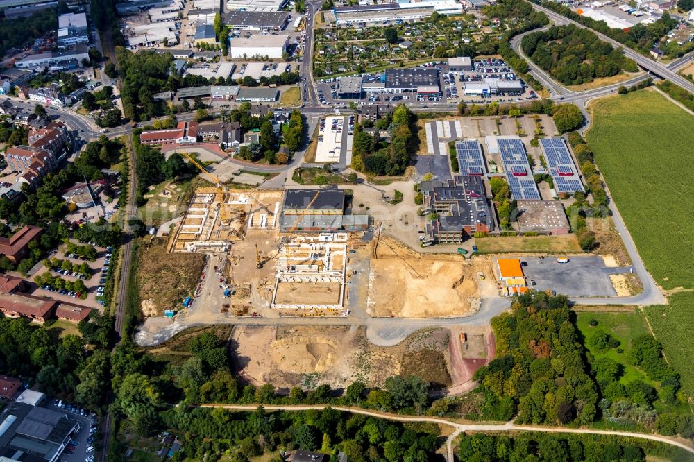 Aerial photograph Moers - New construction site of the building complex of the vocational school Berufskolleg fuer Technik Moers (BKTM) on Repelener Strasse in Moers in the state North Rhine-Westphalia, Germany