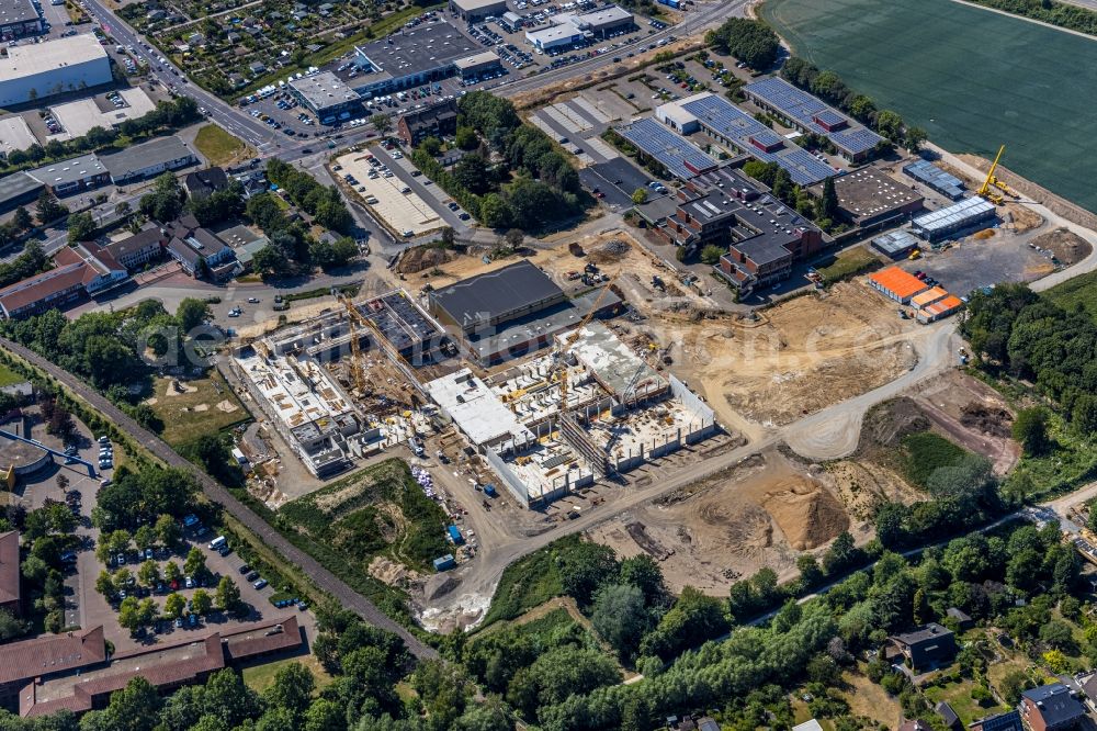 Moers from the bird's eye view: New construction site of the building complex of the vocational school Berufskolleg fuer Technik Moers (BKTM) on Repelener Strasse in Moers in the state North Rhine-Westphalia, Germany