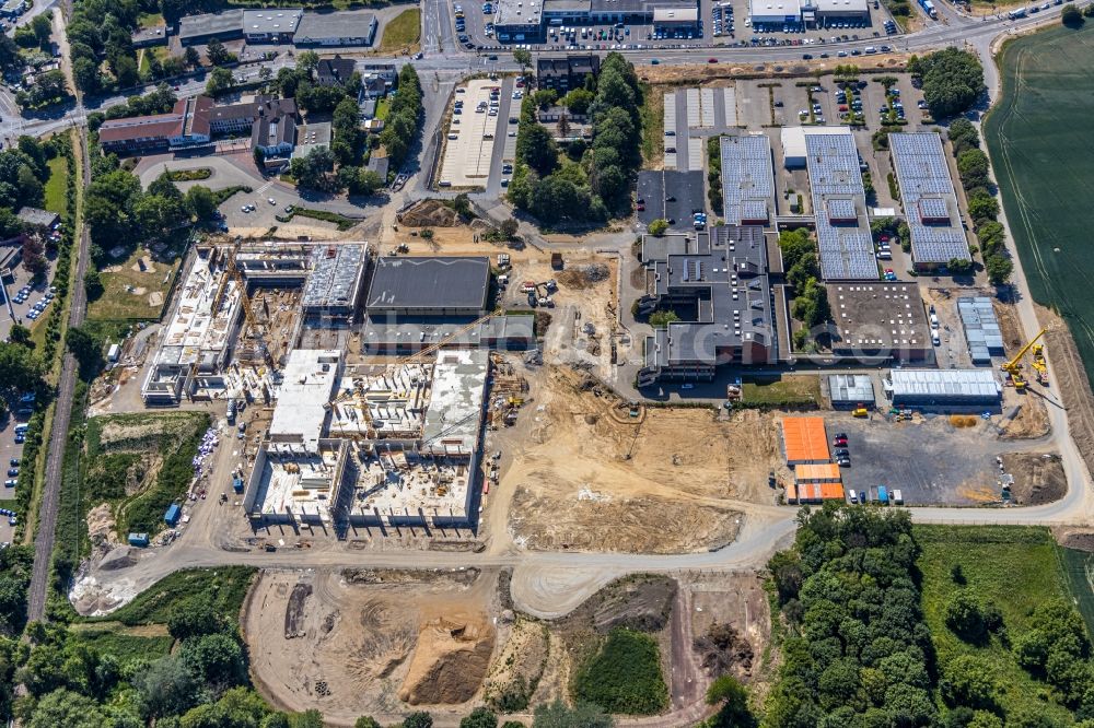 Moers from the bird's eye view: New construction site of the building complex of the vocational school Berufskolleg fuer Technik Moers (BKTM) on Repelener Strasse in Moers in the state North Rhine-Westphalia, Germany