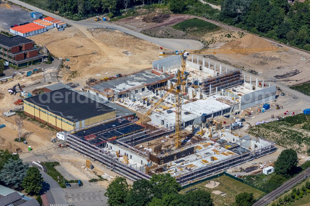 Aerial photograph Moers - New construction site of the building complex of the vocational school Berufskolleg fuer Technik Moers (BKTM) on Repelener Strasse in Moers in the state North Rhine-Westphalia, Germany