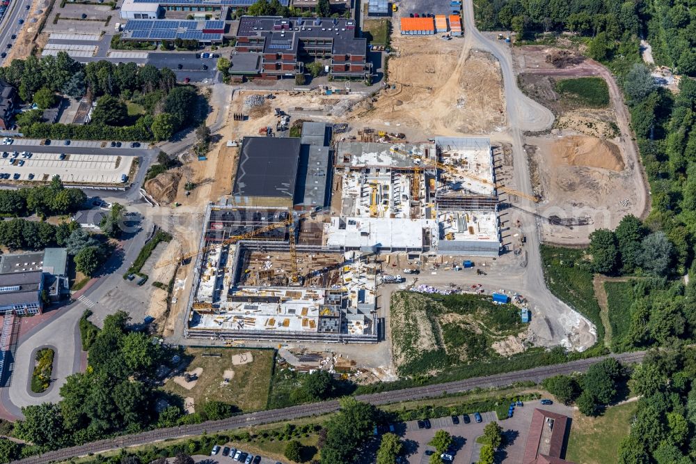 Aerial photograph Moers - New construction site of the building complex of the vocational school Berufskolleg fuer Technik Moers (BKTM) on Repelener Strasse in Moers in the state North Rhine-Westphalia, Germany