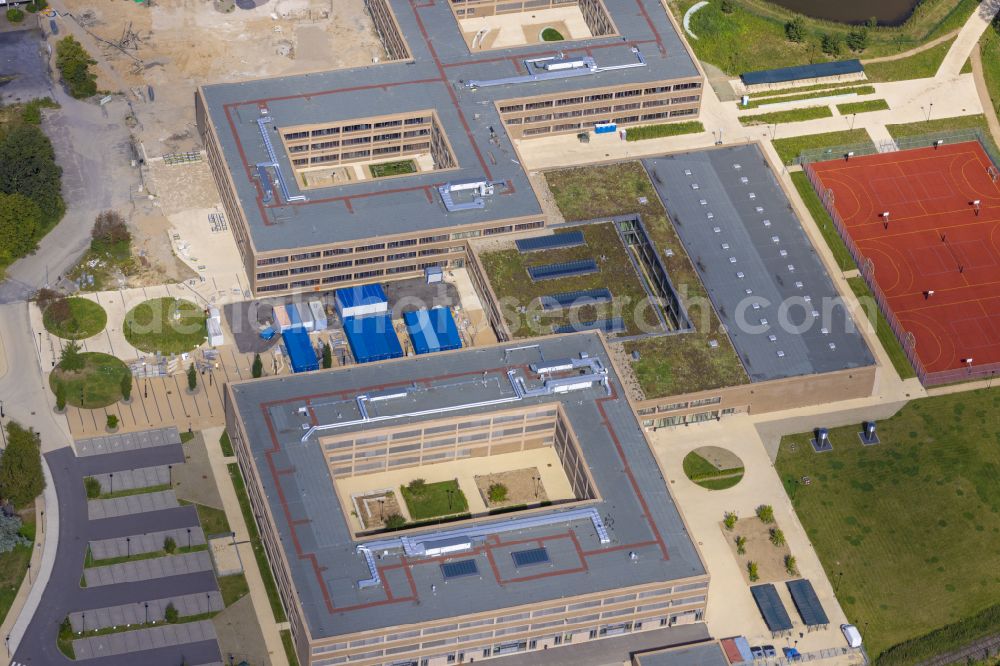 Moers from the bird's eye view: New construction site of the building complex of the vocational school Berufskolleg fuer Technik Moers (BKTM) on Repelener Strasse in Moers in the state North Rhine-Westphalia, Germany