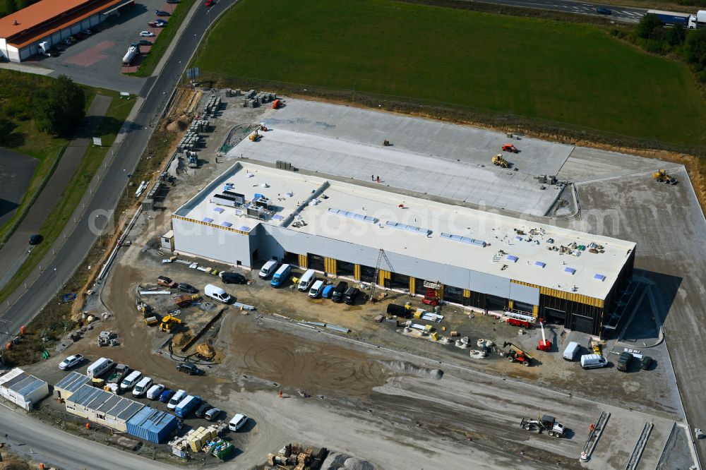 Aerial photograph Leppersdorf - Construction site for the new building complex and site of the truck repair workshop of Daimler Truck - FTA GmbH on the street An den Breiten in Leppersdorf in the state of Saxony, Germany