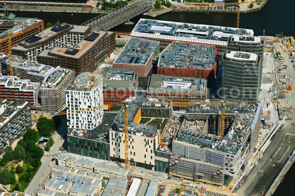 Aerial image Hamburg - Construction site for the new building complex of the shopping center at Ueberseequartier at Strandkai in the Hafencity district in Hamburg, Germany