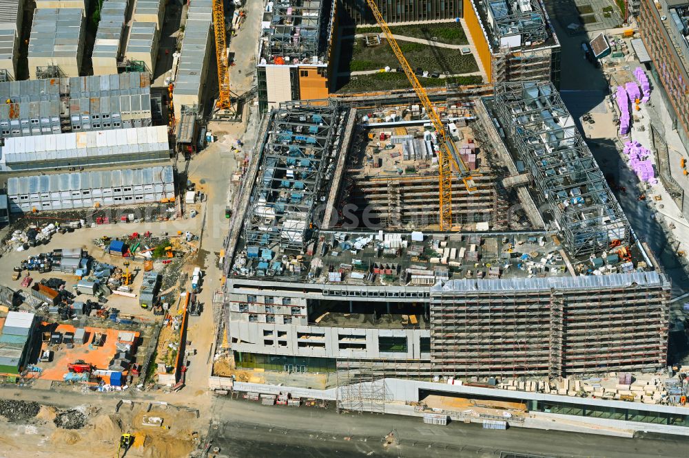 Aerial photograph Hamburg - Construction site for the new building complex of the shopping center at Ueberseequartier at Strandkai in the Hafencity district in Hamburg, Germany