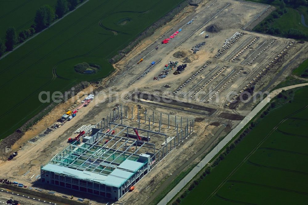 Aerial photograph Rostock - Construction site to build a new building complex on the site of the logistics center Amazon zwischen Barkenstrasse and Containerstrasse in the district Hinrichsdorf in Rostock in the state Mecklenburg - Western Pomerania, Germany