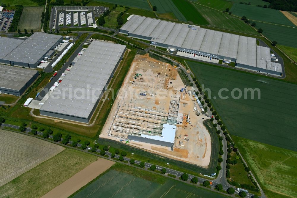 Aerial photograph Peine - Construction site to build a new building complex on the site of the logistics center NEOVIA Logistics - ACTION Distribution in the district Essinghausen in Peine in the state Lower Saxony, Germany