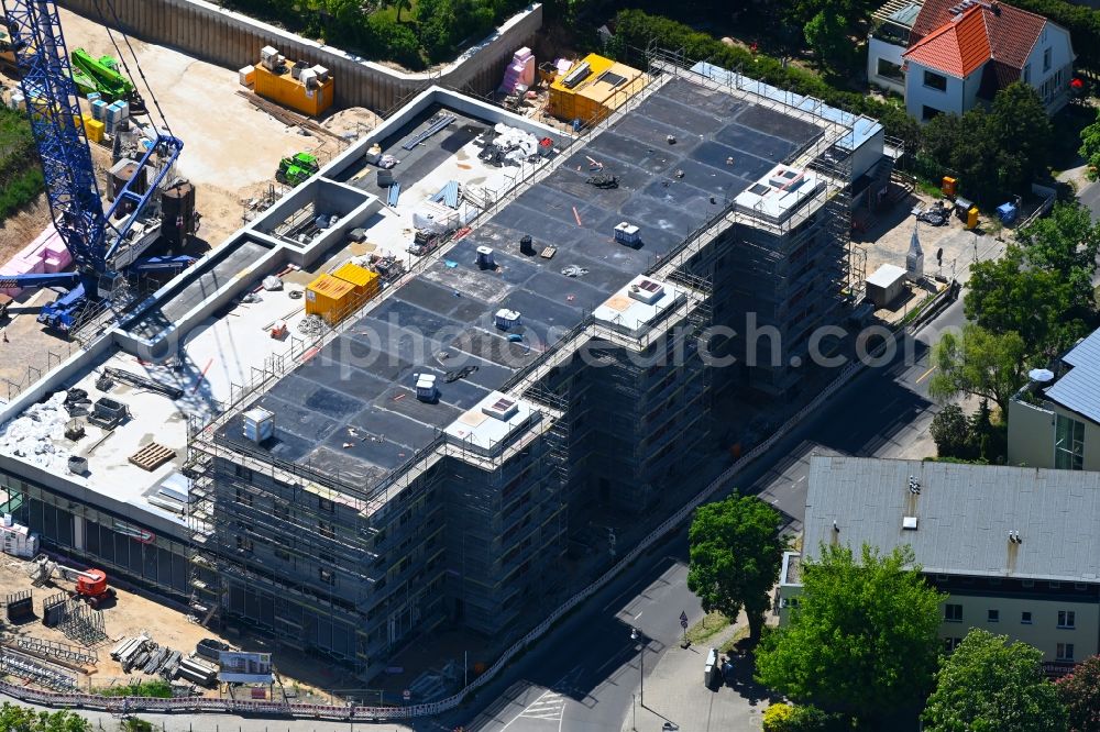 Aerial image Berlin - New construction of the building complex of the LIDL - shopping center on street Giesestrasse corner Hoenoer Strasse in the district Mahlsdorf in Berlin, Germany