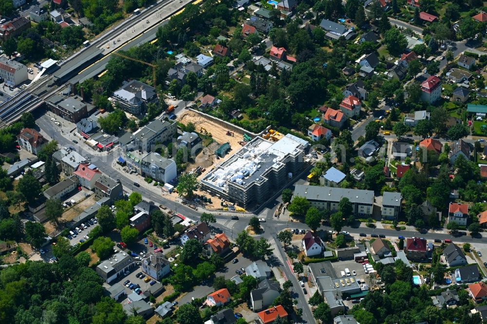 Aerial photograph Berlin - New construction of the building complex of the LIDL - shopping center on street Giesestrasse corner Hoenoer Strasse in the district Mahlsdorf in Berlin, Germany