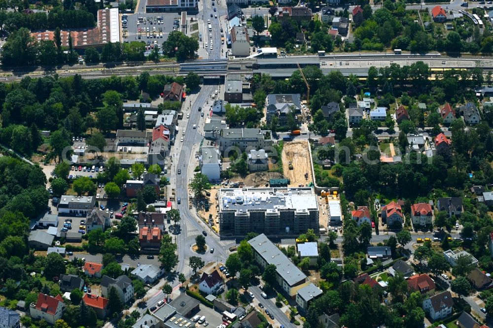 Berlin from the bird's eye view: New construction of the building complex of the LIDL - shopping center on street Giesestrasse corner Hoenoer Strasse in the district Mahlsdorf in Berlin, Germany