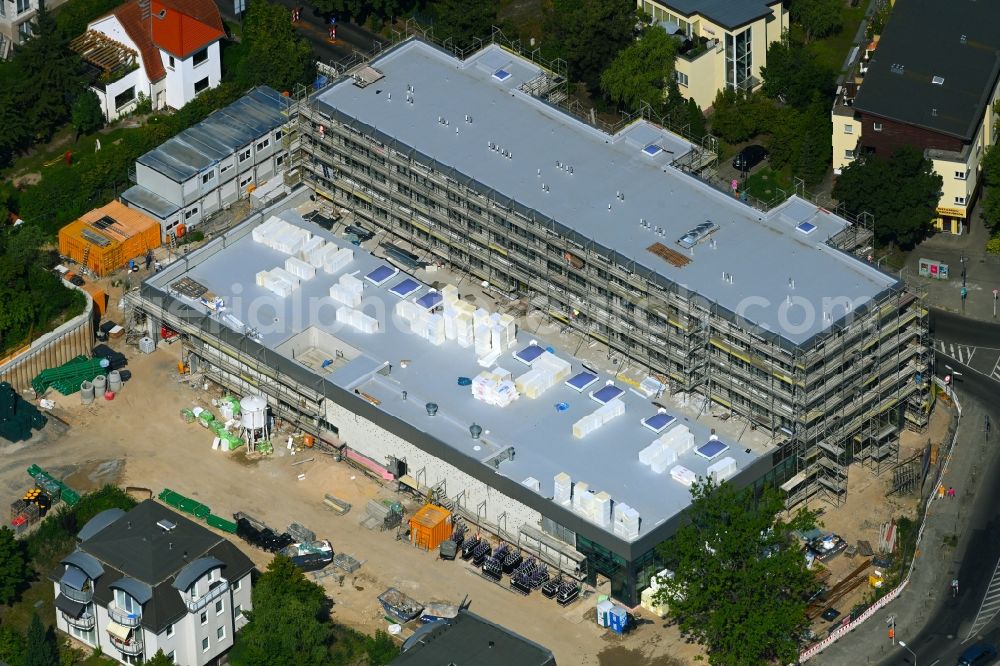 Berlin from above - New construction of the building complex of the LIDL - shopping center on street Giesestrasse corner Hoenoer Strasse in the district Mahlsdorf in Berlin, Germany