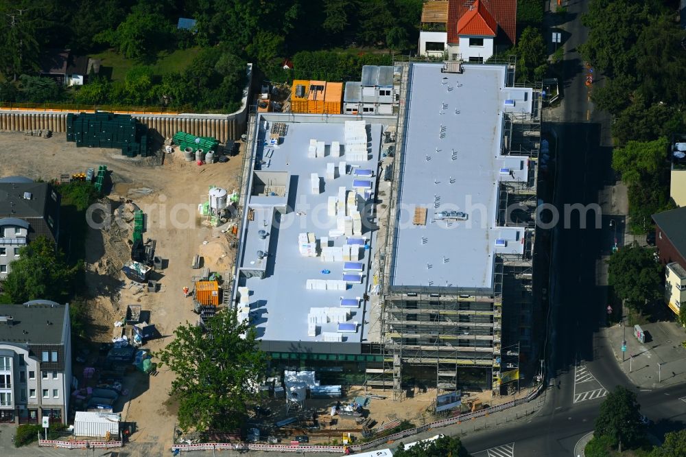 Aerial image Berlin - New construction of the building complex of the LIDL - shopping center on street Giesestrasse corner Hoenoer Strasse in the district Mahlsdorf in Berlin, Germany