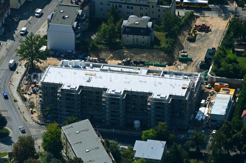 Berlin from the bird's eye view: New construction of the building complex of the LIDL - shopping center on street Giesestrasse corner Hoenoer Strasse in the district Mahlsdorf in Berlin, Germany