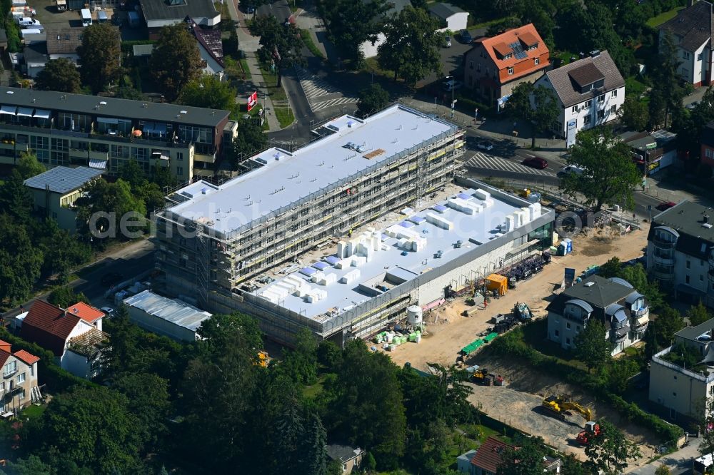 Aerial image Berlin - New construction of the building complex of the LIDL - shopping center on street Giesestrasse corner Hoenoer Strasse in the district Mahlsdorf in Berlin, Germany