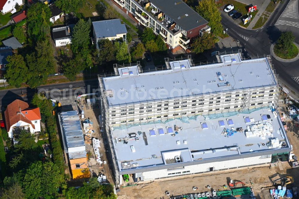 Aerial image Berlin - New construction of the building complex of the LIDL - shopping center on street Giesestrasse corner Hoenoer Strasse in the district Mahlsdorf in Berlin, Germany