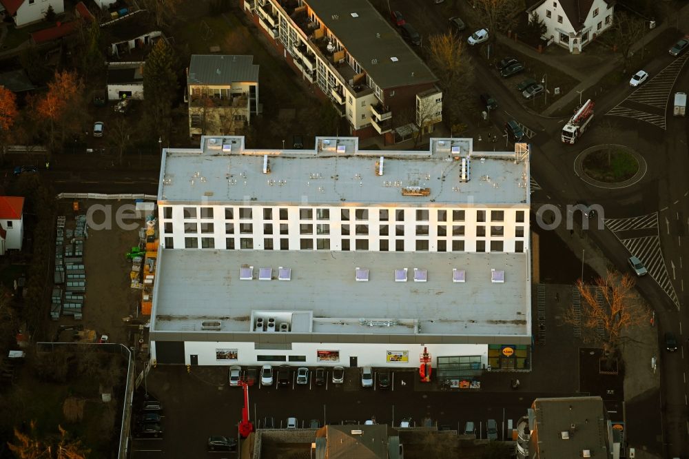 Berlin from above - new construction of the building complex of the LIDL - shopping center on street Giesestrasse corner Hoenoer Strasse in the district Mahlsdorf in Berlin, Germany