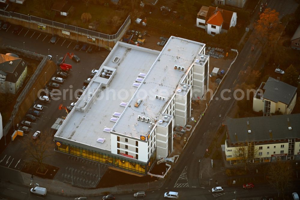 Berlin from above - new construction of the building complex of the LIDL - shopping center on street Giesestrasse corner Hoenoer Strasse in the district Mahlsdorf in Berlin, Germany