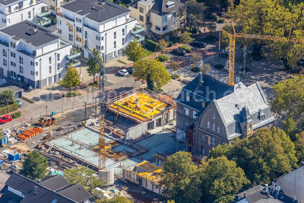 Holzwickede from the bird's eye view: Construction site of Town Hall building of the city administration as a building extension Am Markt - Poststrasse in the district Brackel in Holzwickede in the state North Rhine-Westphalia, Germany