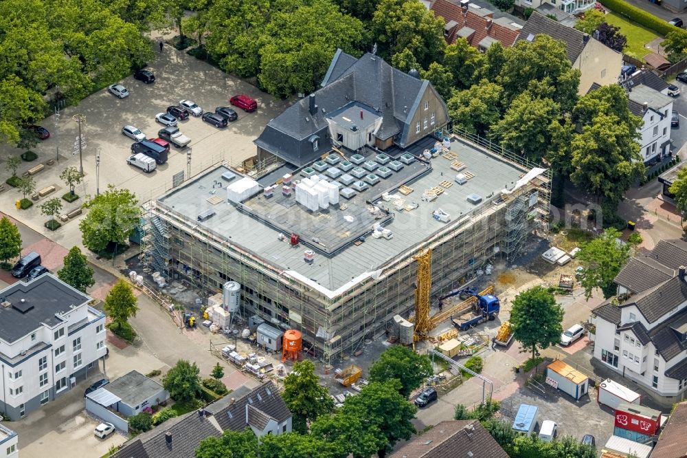 Aerial image Holzwickede - Construction site of Town Hall building of the city administration as a building extension Am Markt - Poststrasse in the district Brackel in Holzwickede at Ruhrgebiet in the state North Rhine-Westphalia, Germany