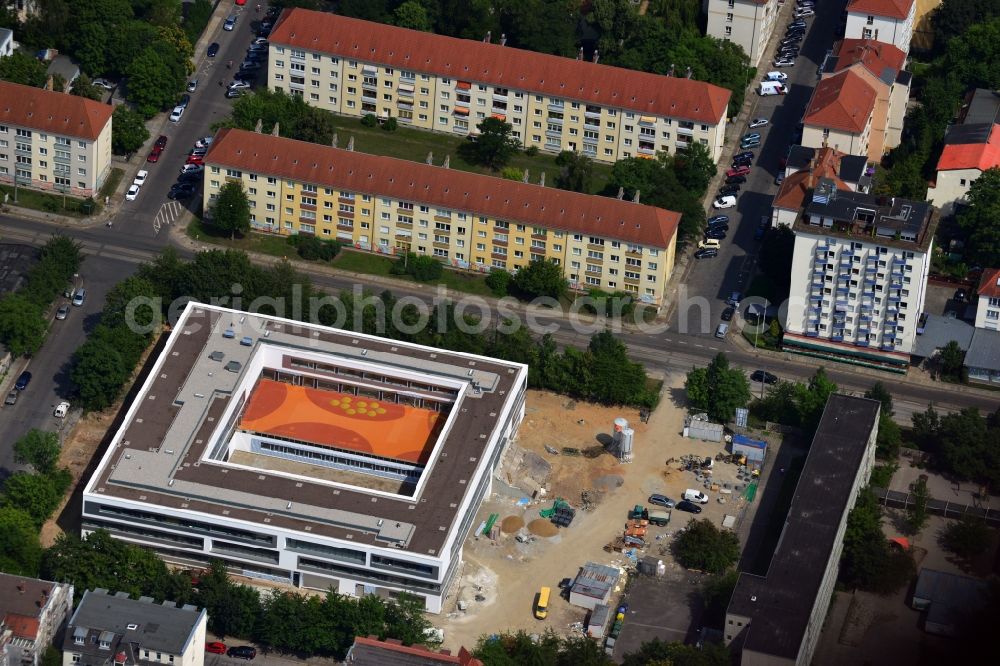 Leipzig from above - Construction of 3rd Primary school at Bernhard Goring Strasse in Leipzig in Saxony. Construction of the new building in the Sudvorstadt began in 2012 and will be completed at the beginning of the school year 2014-15. In addition, the old building will be renovated. The planning of the project was overseen by JSWD architects