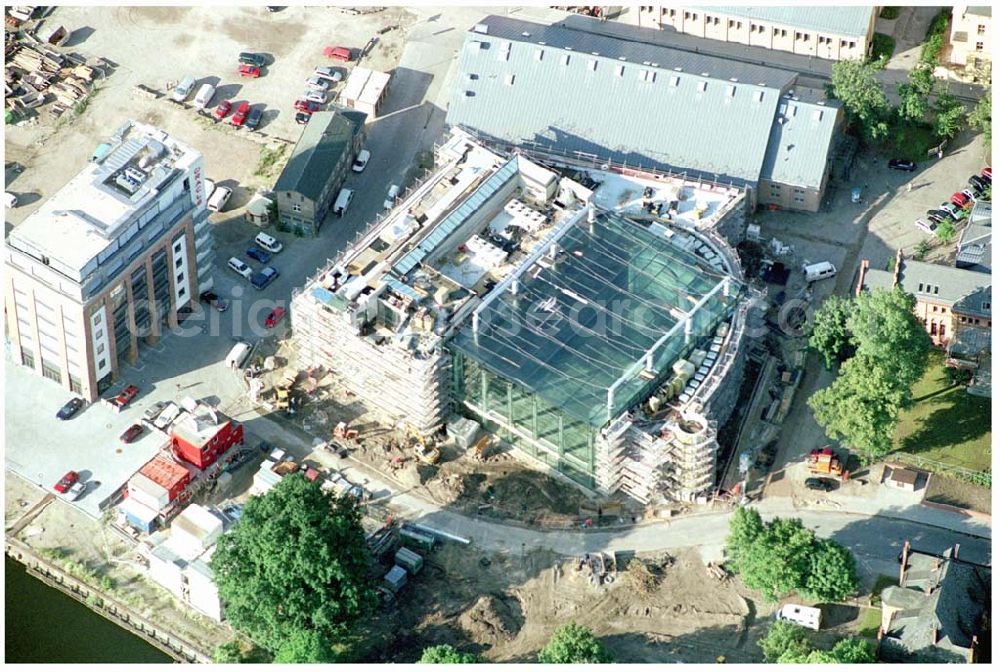 Potsdam from the bird's eye view: Neubau des Hans-Otto-Theaters und Neubauten am Gelände des alten Gaswerkes an der Schiffbauergasse/ Berliner Straße am Tiefen See in Potsdam - Firmen: 1) König Spezialtiefbau