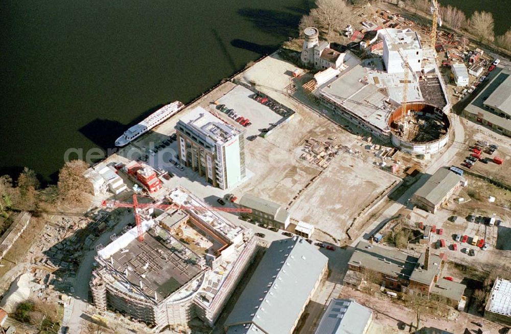 Potsdam from the bird's eye view: Neubau des Hans-Otto-Theaters und Neubauten am Gelände des alten Gaswerkes an der Schiffbauergasse/ Berliner Straße am Tiefen See in Potsdam - Firmen: 1) König Spezialtiefbau