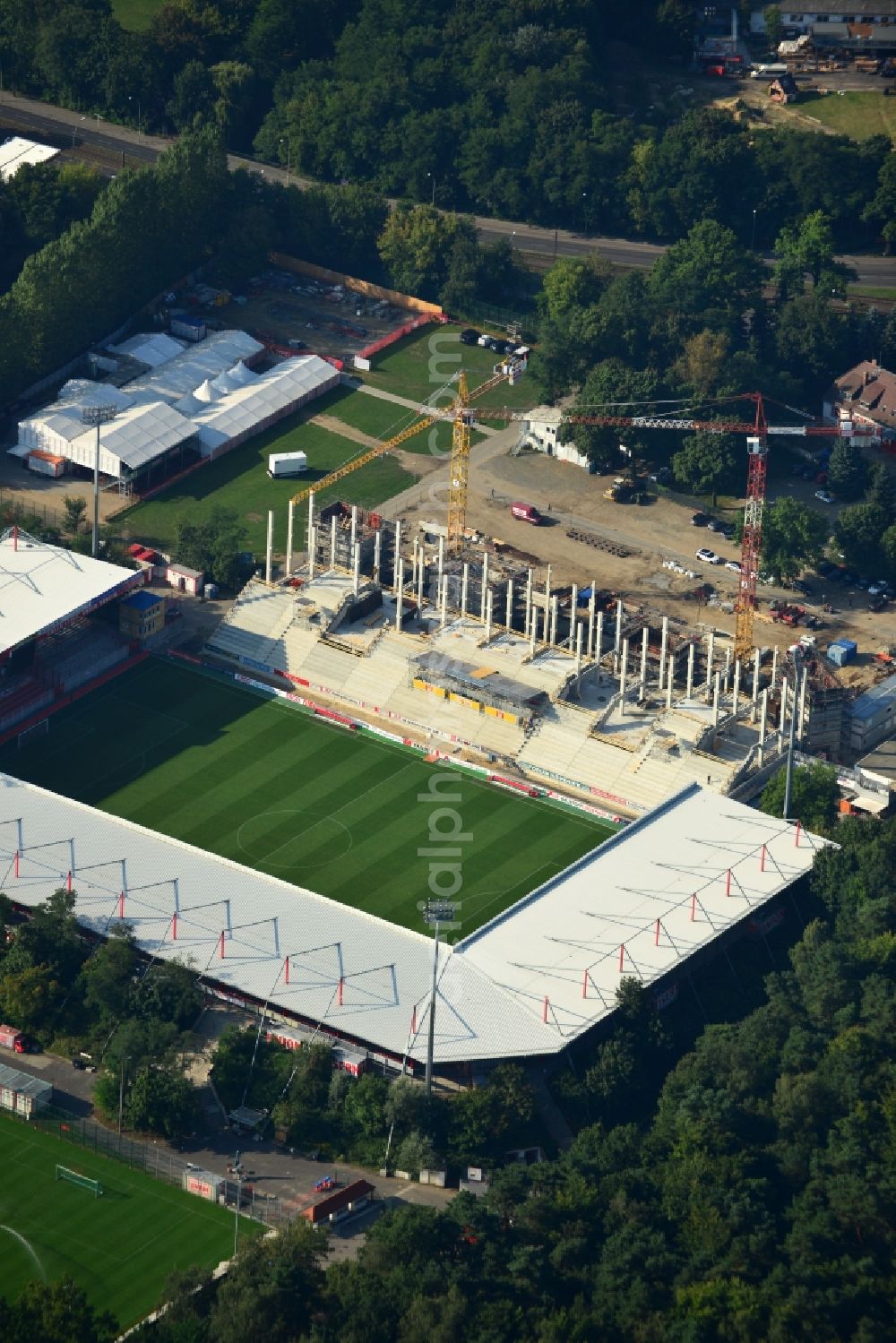 Aerial photograph Berlin - View at the new building of the main grandstand at the stadium At the old forester in the Wuhlheide in the Köpenick district of Berlin. Responsible for the construction is the brewer Baugesellschaft mbH & Co KG. The stadium is operated by at the old forester stadium operations AG