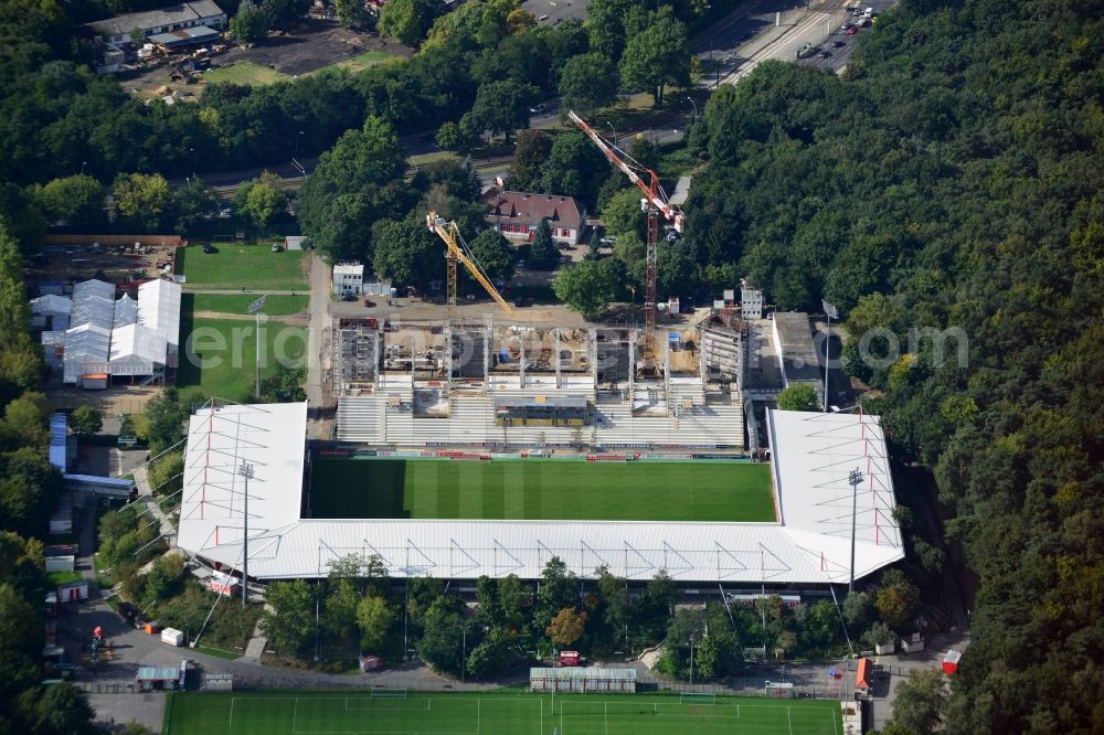 Aerial image Berlin - View at the new building of the main grandstand at the stadium At the old forester in the Wuhlheide in the Köpenick district of Berlin. Responsible for the construction is the brewer Baugesellschaft mbH & Co KG. The stadium is operated by at the old forester stadium operations AG