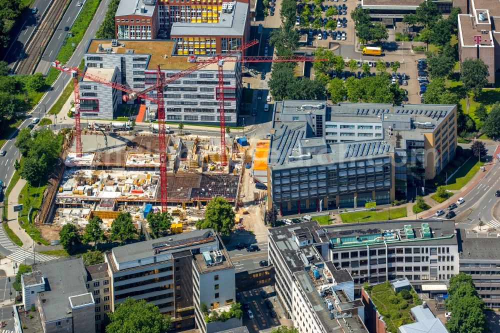 Essen from the bird's eye view: New construction high-rise construction site the hotel complex NOVUM STYLE in Essen in the state North Rhine-Westphalia