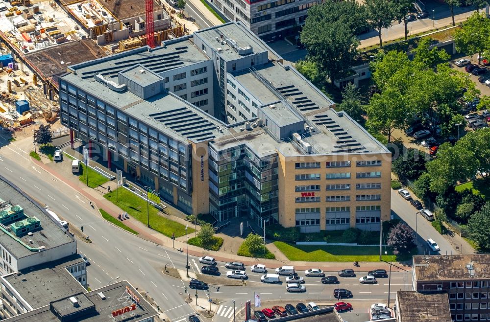 Essen from the bird's eye view: New construction high-rise construction site the hotel complex NOVUM STYLE in Essen in the state North Rhine-Westphalia