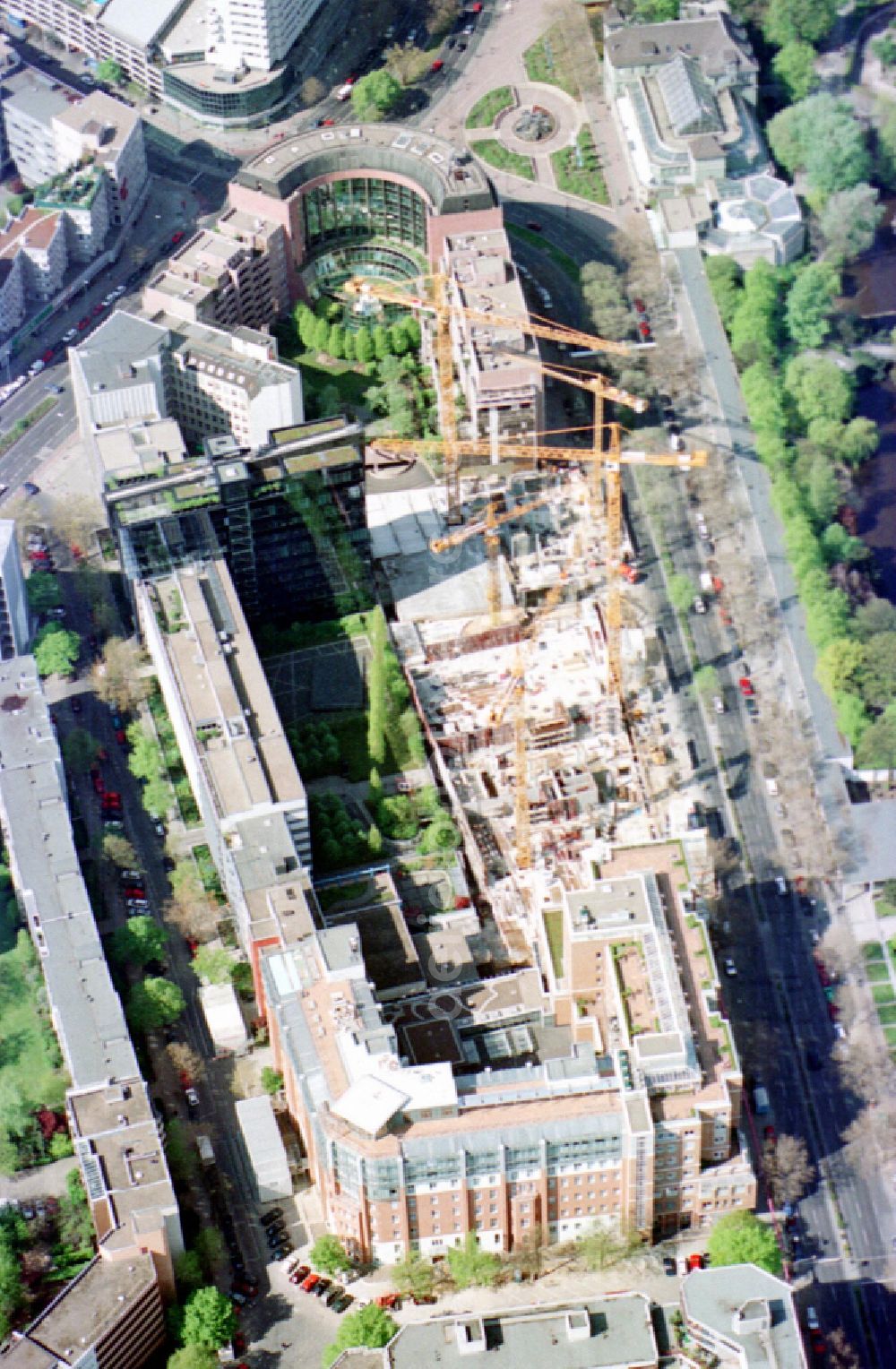 Berlin from above - New construction high-rise construction site the hotel complex Pullman Berlin Schweizerhof on street Budapester Strasse in the district Tiergarten in Berlin, Germany