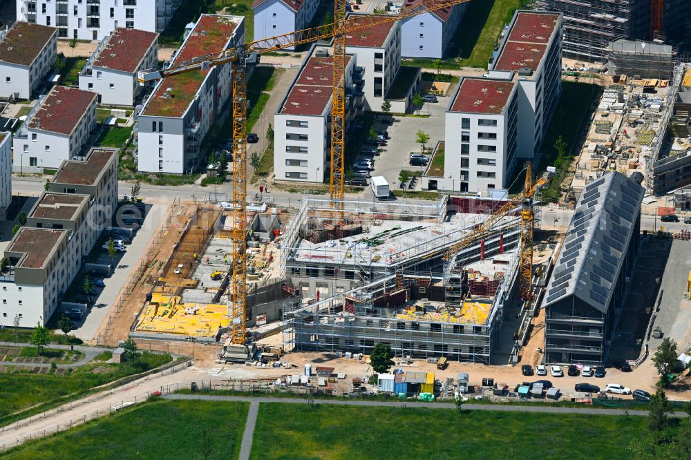 Mannheim from the bird's eye view: Construction site for the new construction of the residential high-rise building Wohnhochhaus Hochpunkt H on street George-Washington-Strasse in the district Kaefertal in Mannheim in the state Baden-Wuerttemberg, Germany