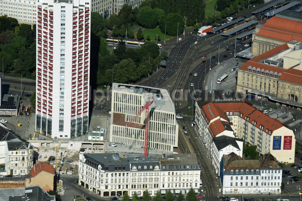 Leipzig from the bird's eye view: Site for New High-Rise building complex of the headquarters of the Leipziger Wohnungs- und Baugesellschaft (LWB) on Wintergartenhochhaus - skyscraper in Leipzig in Saxony