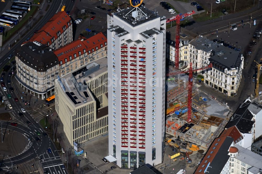 Leipzig from the bird's eye view: Site for New High-Rise building complex of the headquarters of the Leipziger Wohnungs- und Baugesellschaft (LWB) on Wintergartenhochhaus - skyscraper in Leipzig in Saxony