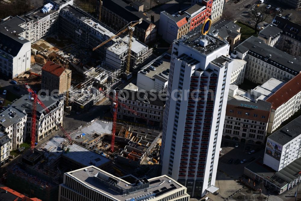 Leipzig from the bird's eye view: Site for New High-Rise building complex of the headquarters of the Leipziger Wohnungs- und Baugesellschaft (LWB) on Wintergartenhochhaus - skyscraper in Leipzig in Saxony