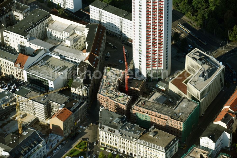 Leipzig from the bird's eye view: Site for New High-Rise building complex of the headquarters of the Leipziger Wohnungs- und Baugesellschaft (LWB) on Wintergartenhochhaus - skyscraper in Leipzig in Saxony