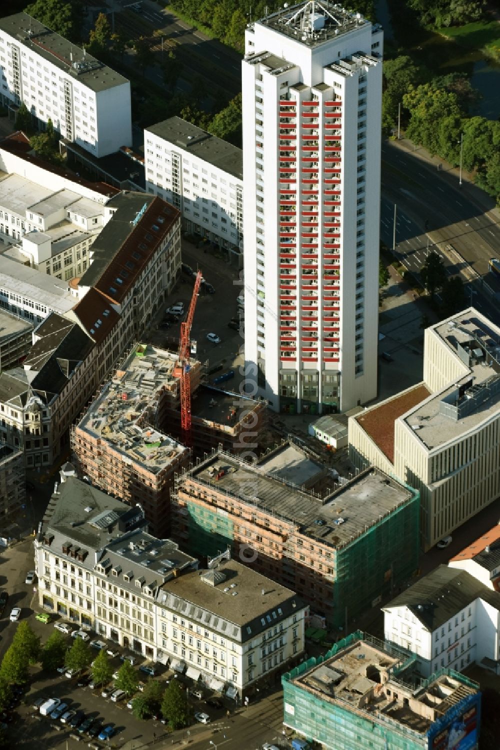 Aerial photograph Leipzig - Site for New High-Rise building complex of the headquarters of the Leipziger Wohnungs- und Baugesellschaft (LWB) on Wintergartenhochhaus - skyscraper in Leipzig in Saxony