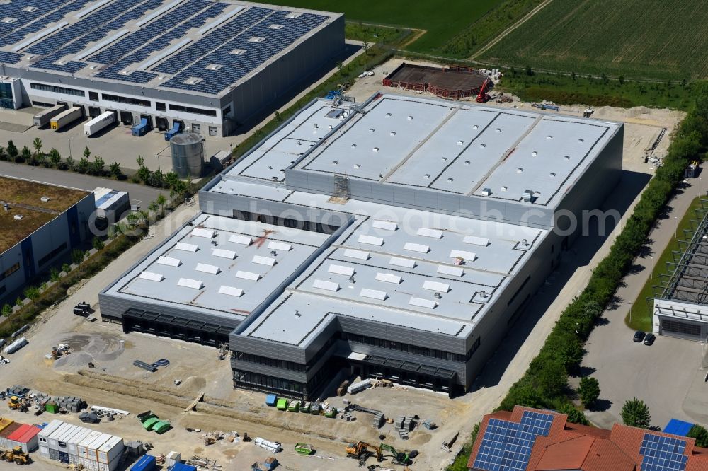 Gernlinden from the bird's eye view: Construction site and assembly work for the construction of a high-bay warehouse building complex and logistics center on the premises on Ganghoferstrasse in Gernlinden in the state Bavaria, Germany