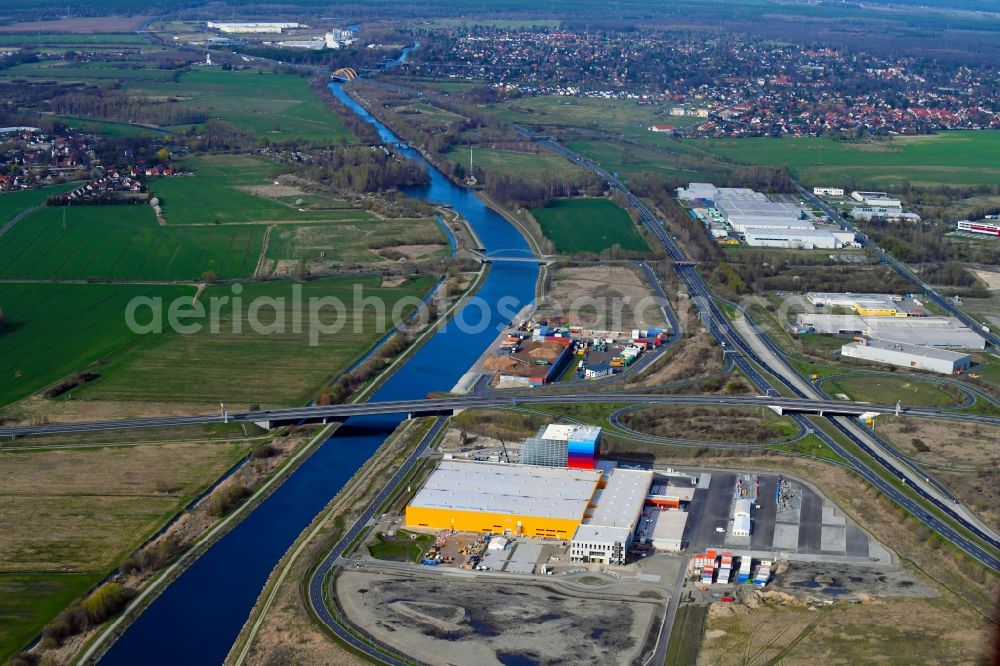 Wustermark from above - Construction site and assembly work for the construction of a high-bay warehouse building complex and logistics center on the premises dm VZ Verteilerzentrum in Wustermark in the state Brandenburg, Germany