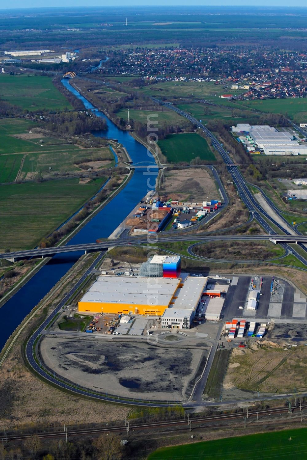 Aerial image Wustermark - Construction site and assembly work for the construction of a high-bay warehouse building complex and logistics center on the premises dm VZ Verteilerzentrum in Wustermark in the state Brandenburg, Germany