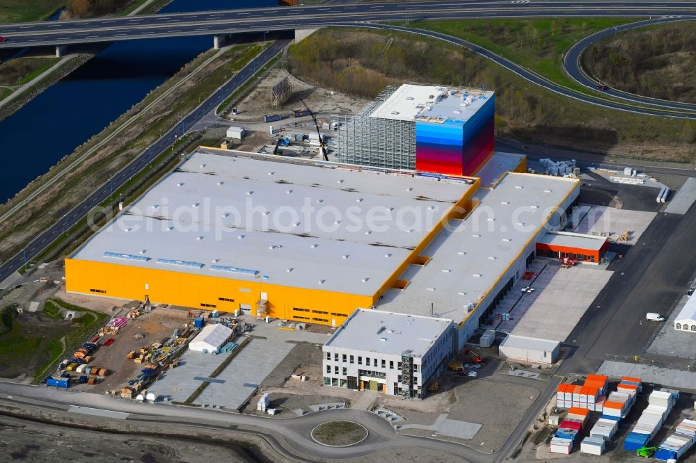 Aerial image Wustermark - Construction site and assembly work for the construction of a high-bay warehouse building complex and logistics center on the premises dm VZ Verteilerzentrum in Wustermark in the state Brandenburg, Germany